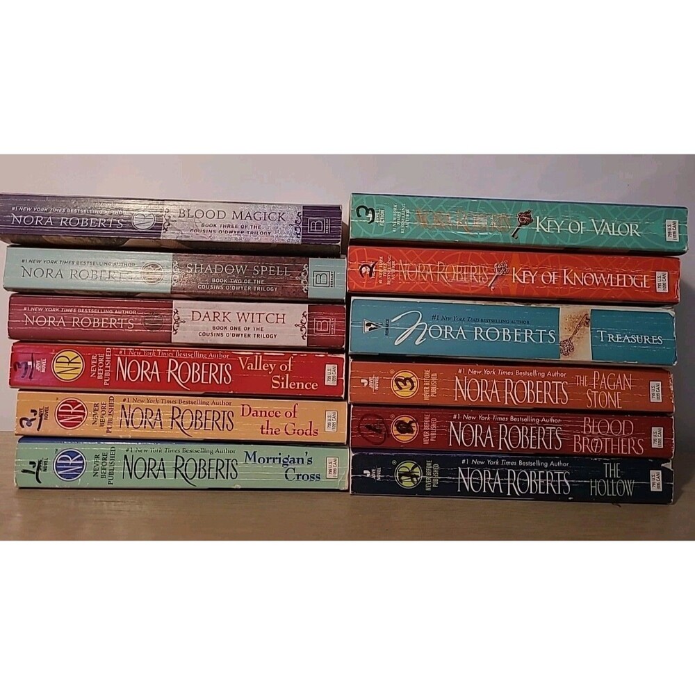 Lot of 12 Books Nora Roberts Paperback Trilogies Key Circle Sign Seven Cousins